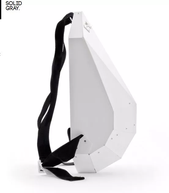 The Solid Gray backpack features a rigid foldable design, and is made from a single sheet of copolymer