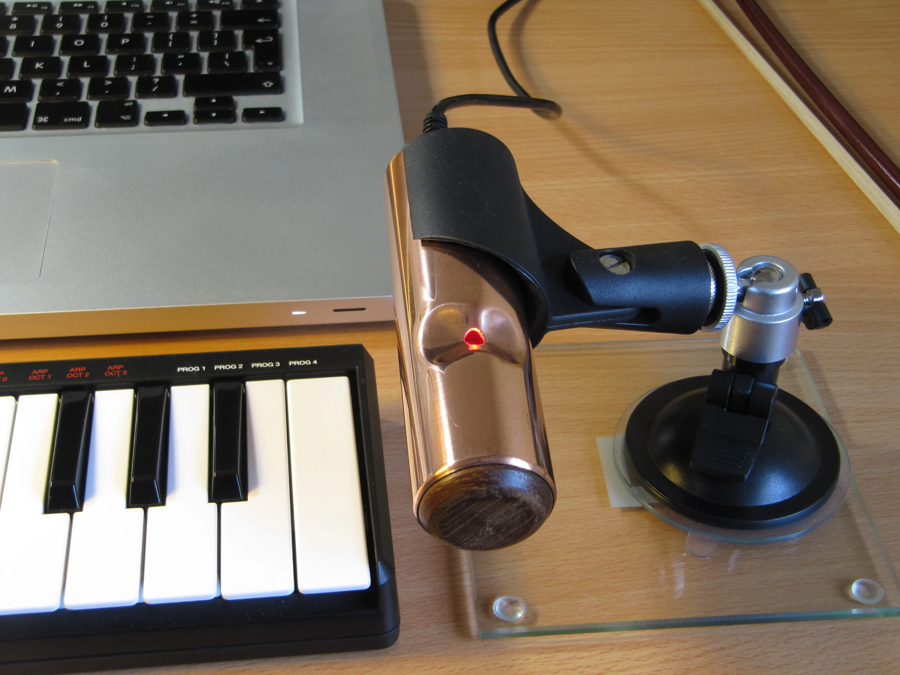 The housing can be attached to a standard microphone grip