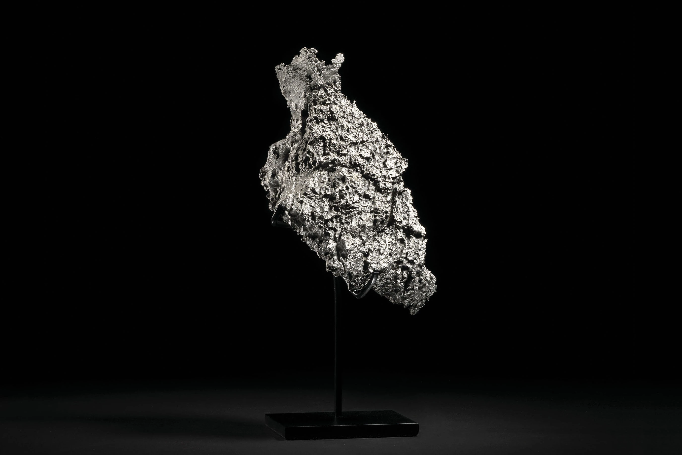 Named after the small Russian town situated close to its discovery site, Dronino meteorites are iron-rich meteorites boasting an exotic chemical composition. This specimen measures 91⁄4 x 43⁄4 x 41⁄2 inches (24 x 12.5 x 12 cm) and weighs 5.4 kg