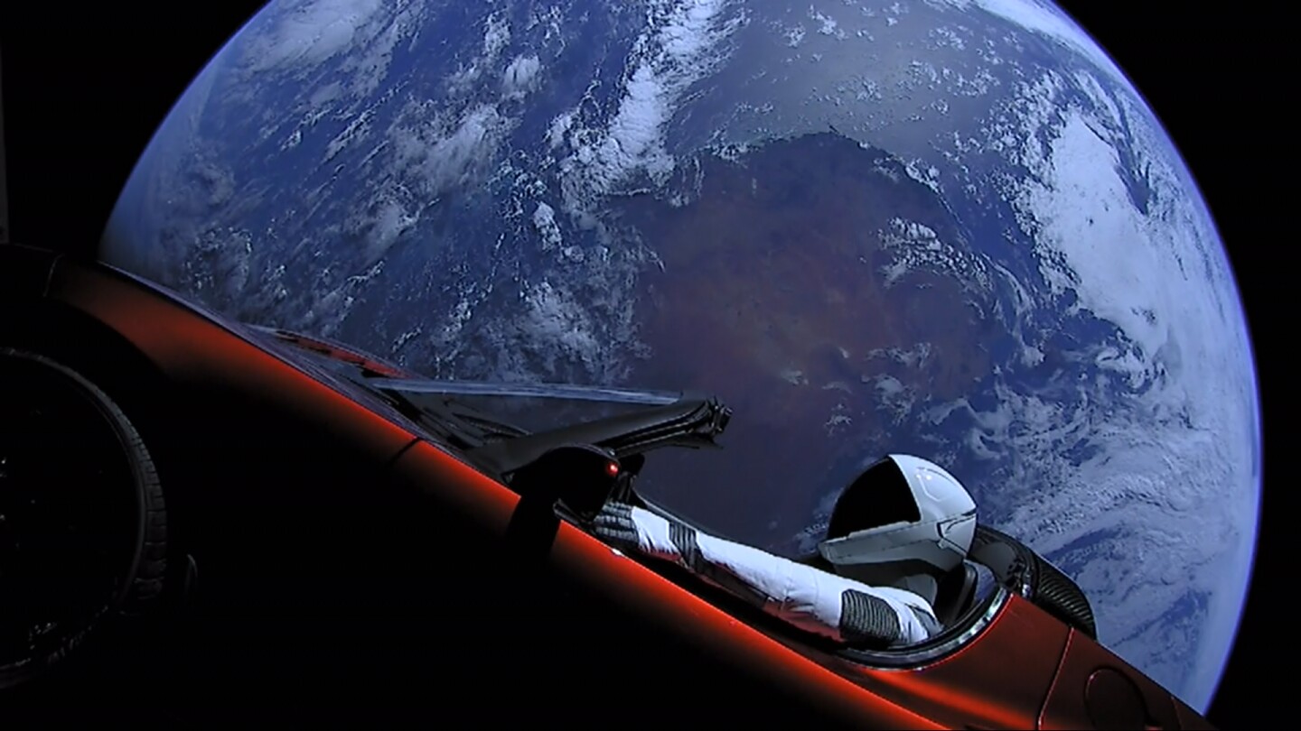 Starman racing the Earth