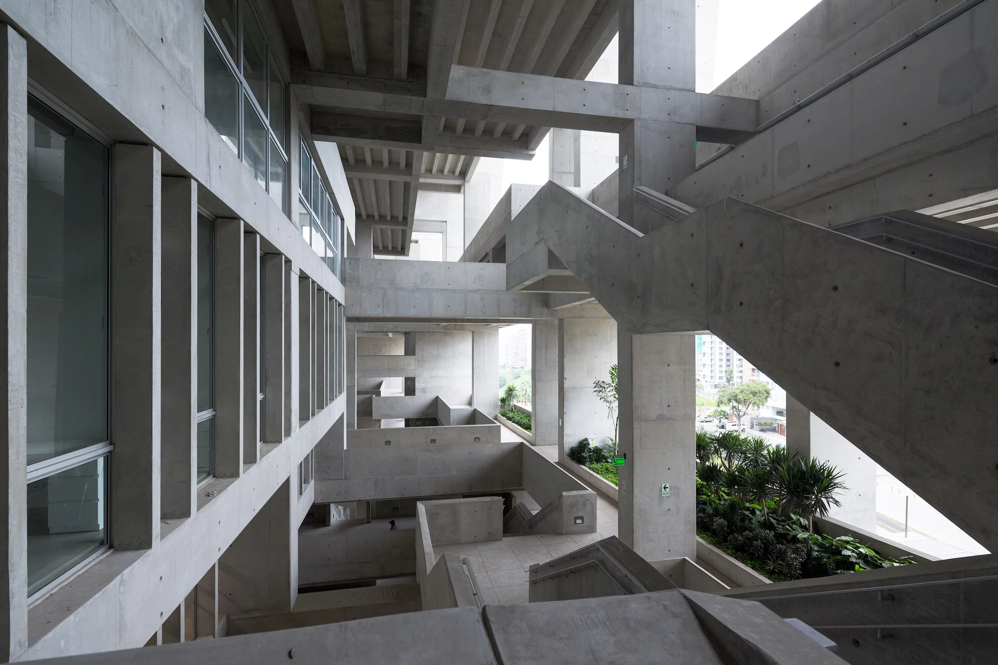 University Campus UTEC Lima's criss-crossing forms create shaded nooks for students to relax
