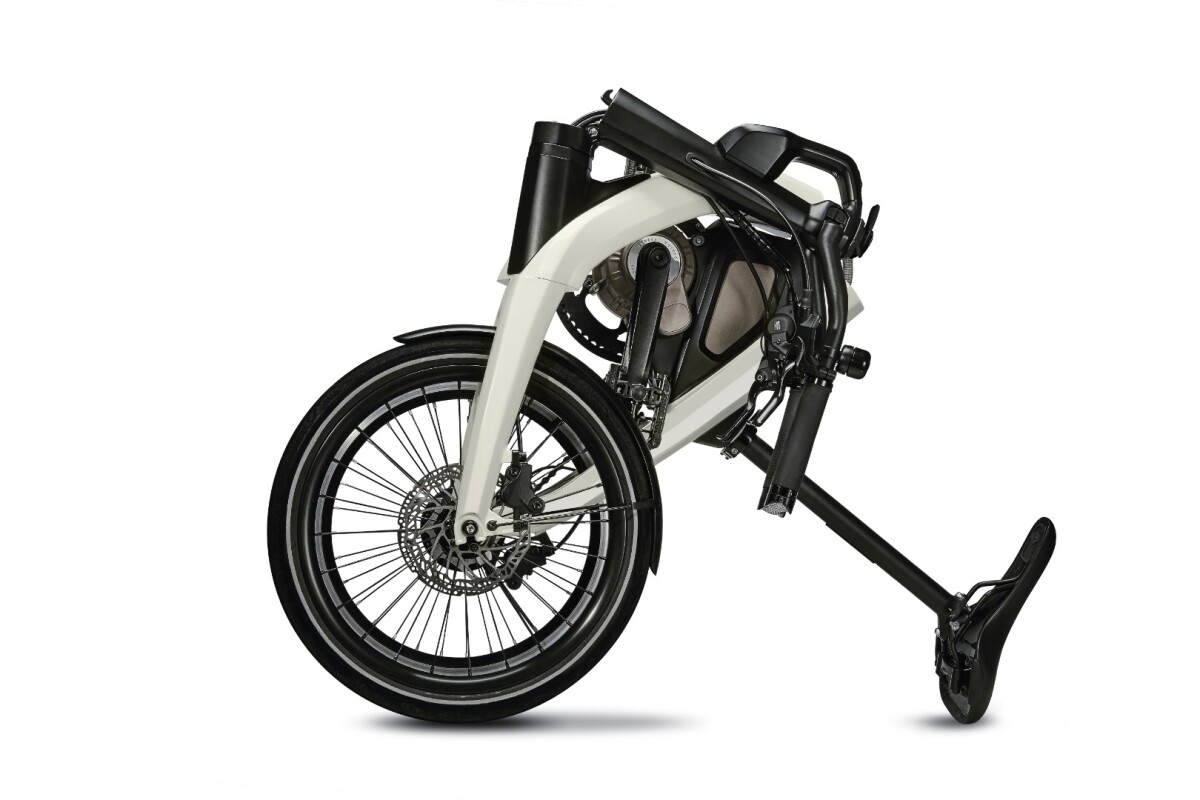 It looks like riders will be able to roll GM's upcoming folding e-bike along using the seat to guide it