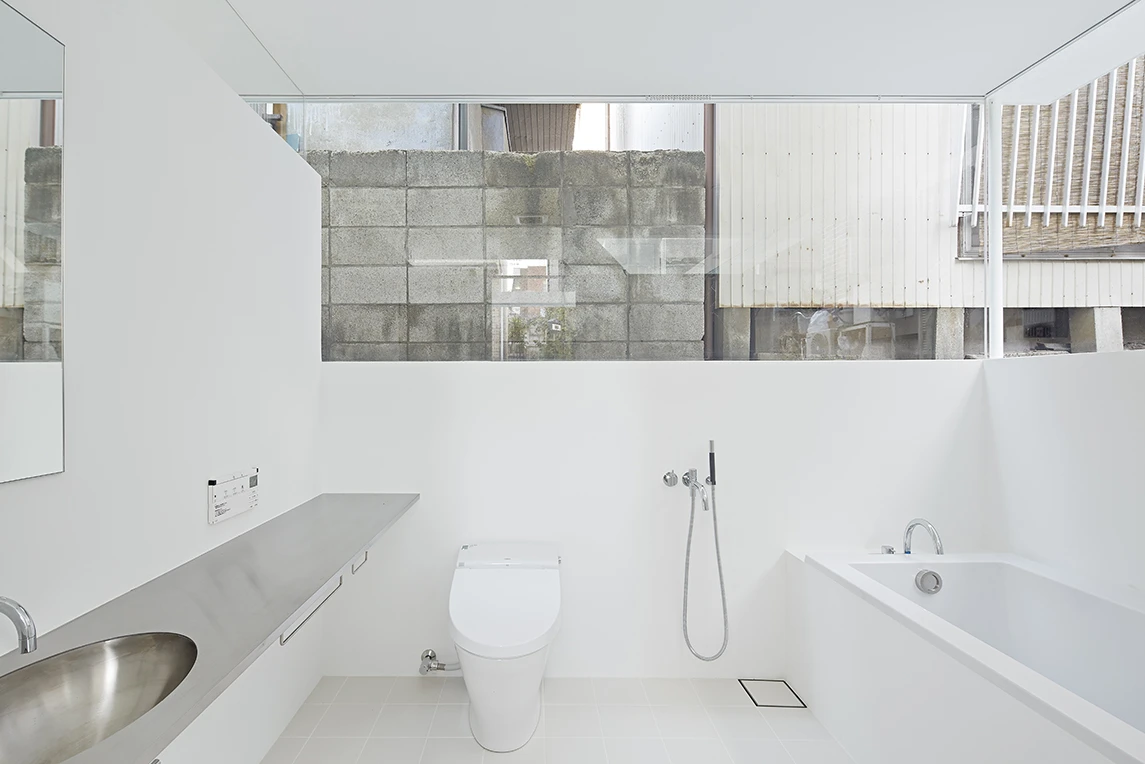 The bathroom is sunk under street level and offers some privacy at least (Photo: Koichi Torimura)