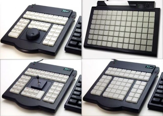 An array of X-keys programmable key pads - can be programmed for almost any computer-related task to provide additional speed and productivity