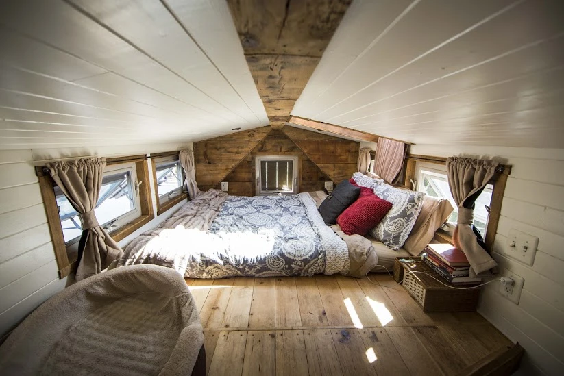 A queen bed is found in the loft
