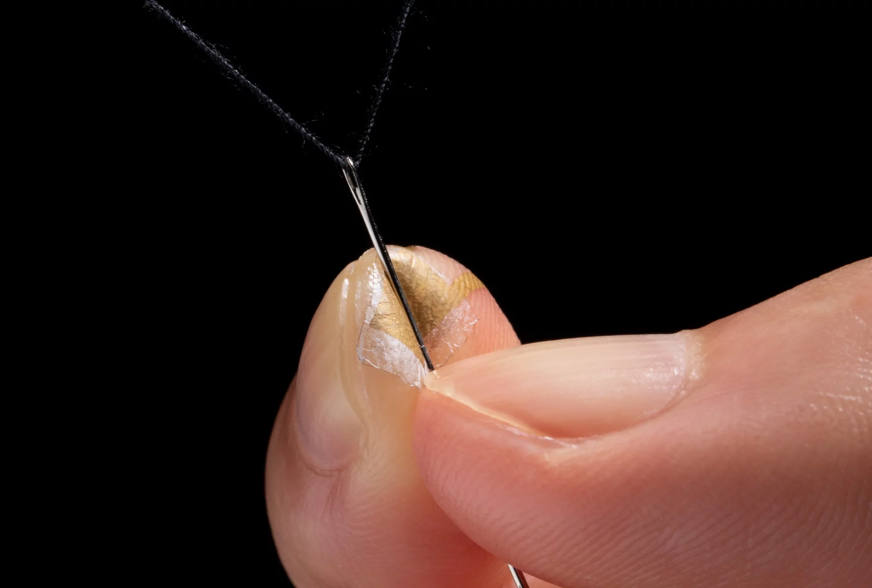 The nanomesh sensor is described as being "much thinner than a human hair"