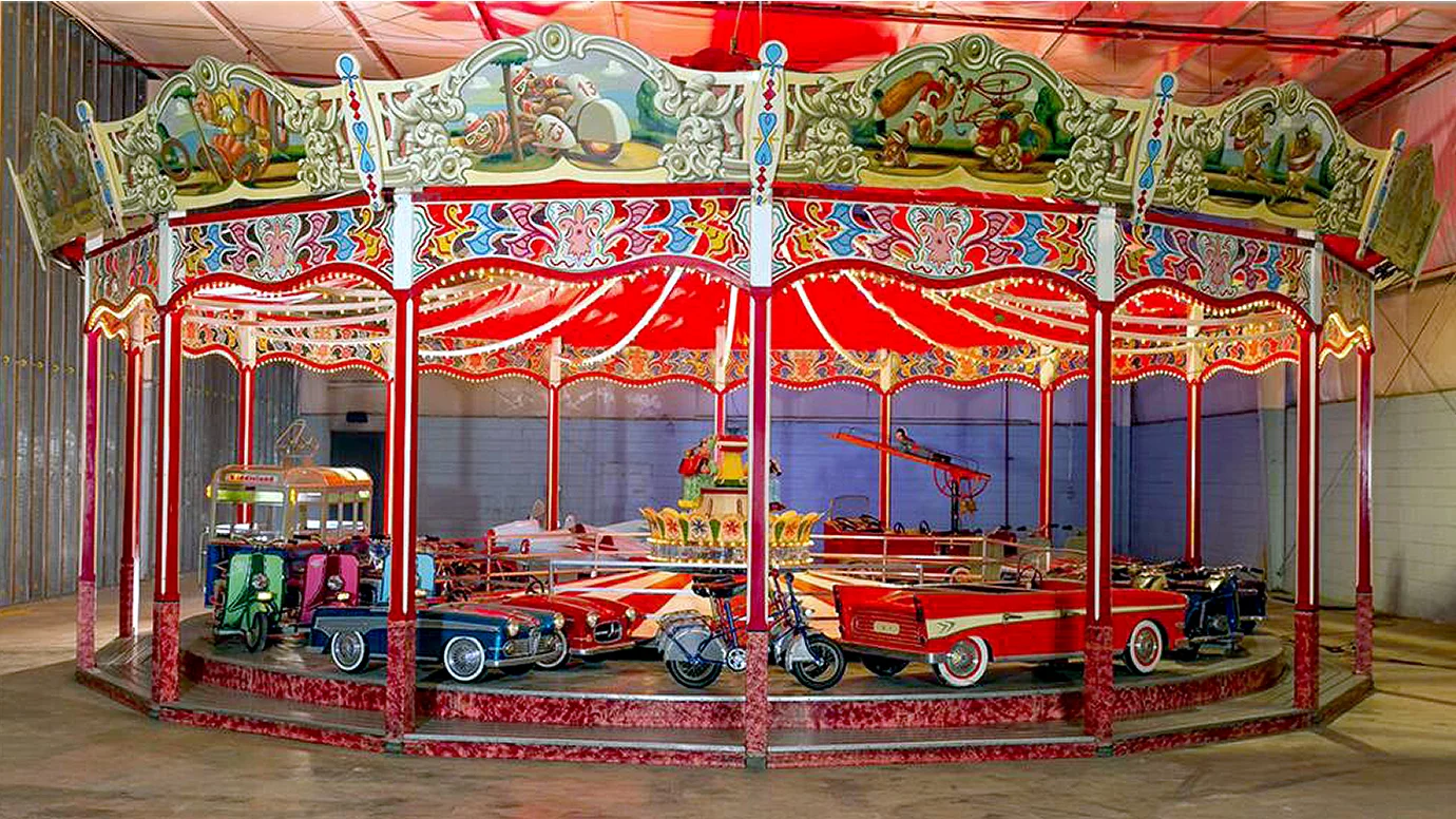 They don't make them like this any more. One of five Wilhelm Hennecke carousels imported to the United States during the 1950s, this transportation-themed carousel is claimed to be the finest surviving example. The history of Hennecke Carousels can be found here. This beautifully restored carousel sold for $557,750 at Barrett-Jackson's Scottsdale 2018 auction.