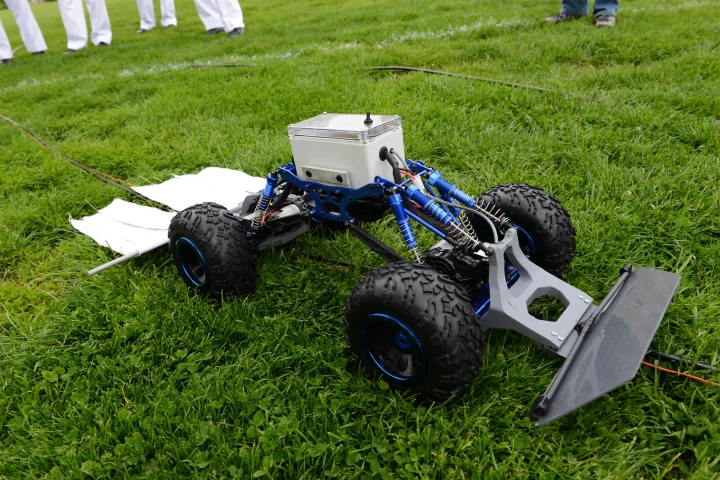 The tick rover drags an insecticide-laced cloth behind it (Photo: VMI Photos by John Robertson IV)