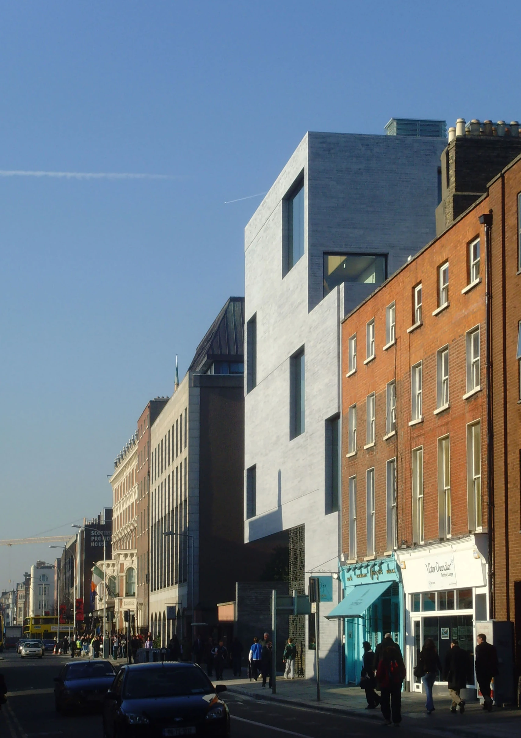 The Offices for the Department of Finance is finished in local limestone and its windows have vents installed below them to help circulate fresh air throughout the building