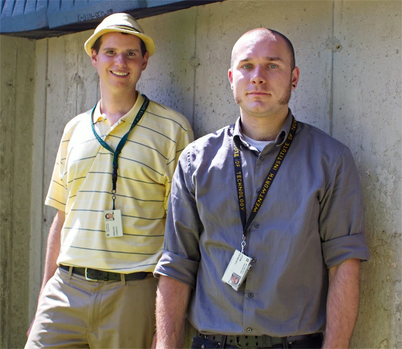 Lincoln Laboratory researchers Gregory Charvat, background, and John Peabody, foreground, stand before the solid concrete wall through which they successfully detected and captured human movement. (Photo: Melanie Gonick)