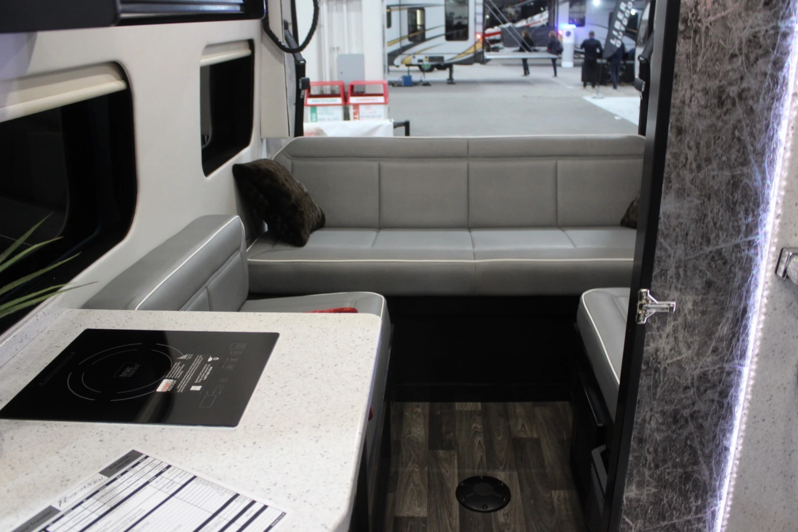Alternate Regency National Traveler floor plan with full-width rear couch and side benches