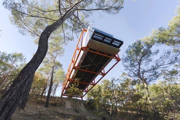 The Richard Rogers' Drawing Gallery is raised at a maximum height of 18 m (60 ft) above the forest floor