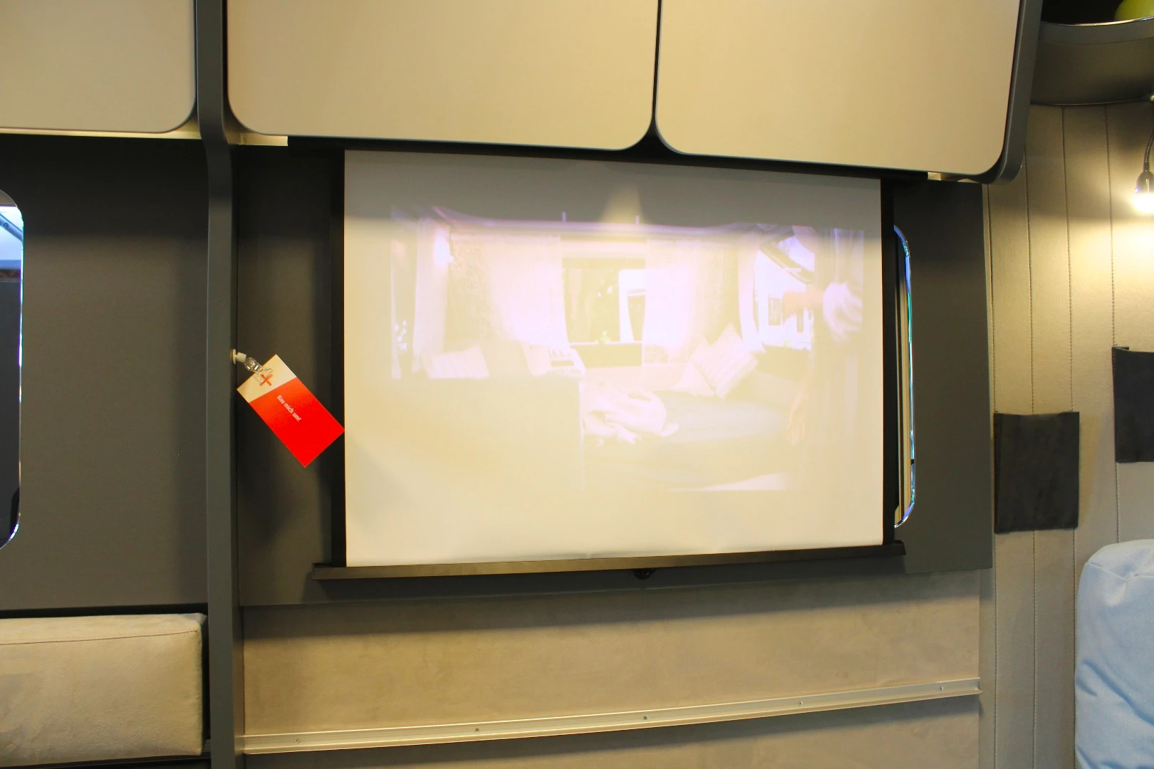 We don't see it on the option sheet, but Dethleffs has a projector system inside at the show