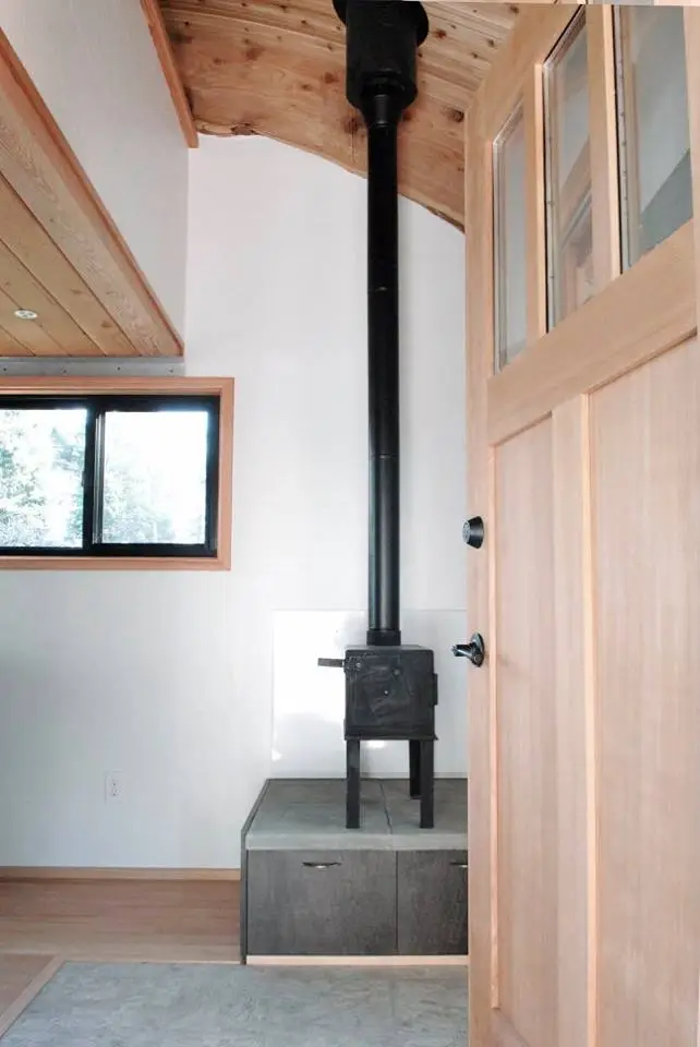 The wood-burning stove should help keep the chill at bay