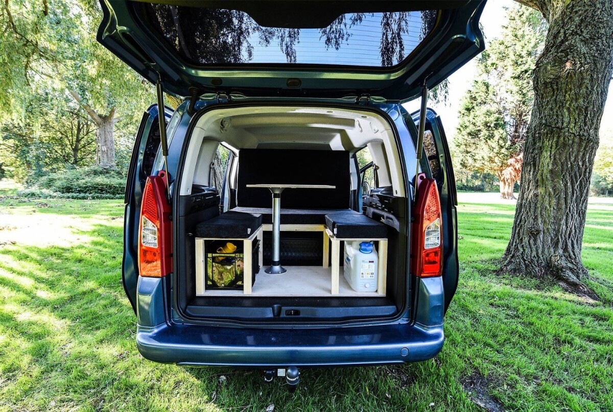 Simple kit turns small vans or crossovers into cozy micro campervans
