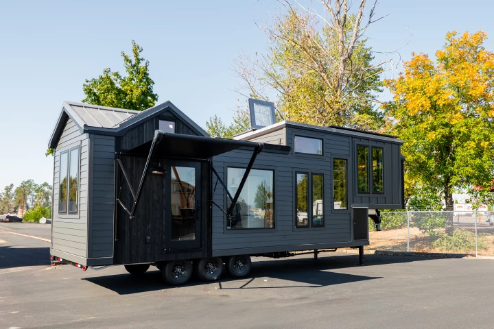 This recently completed off-grid tiny house, by Tru Form Tiny, provides a luxurious interior suitable for living and working