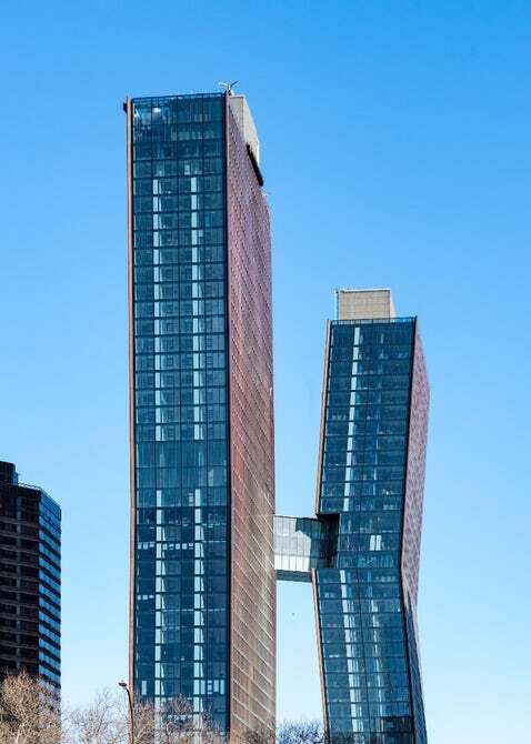 The American Copper Buildings are connected by a sky bridge which includes amenities like a lap pool and hot tub