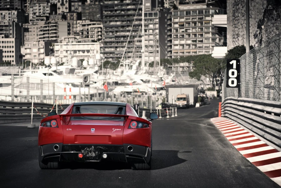 A red GTA Spano heading into the chicane on the Monaco GP track