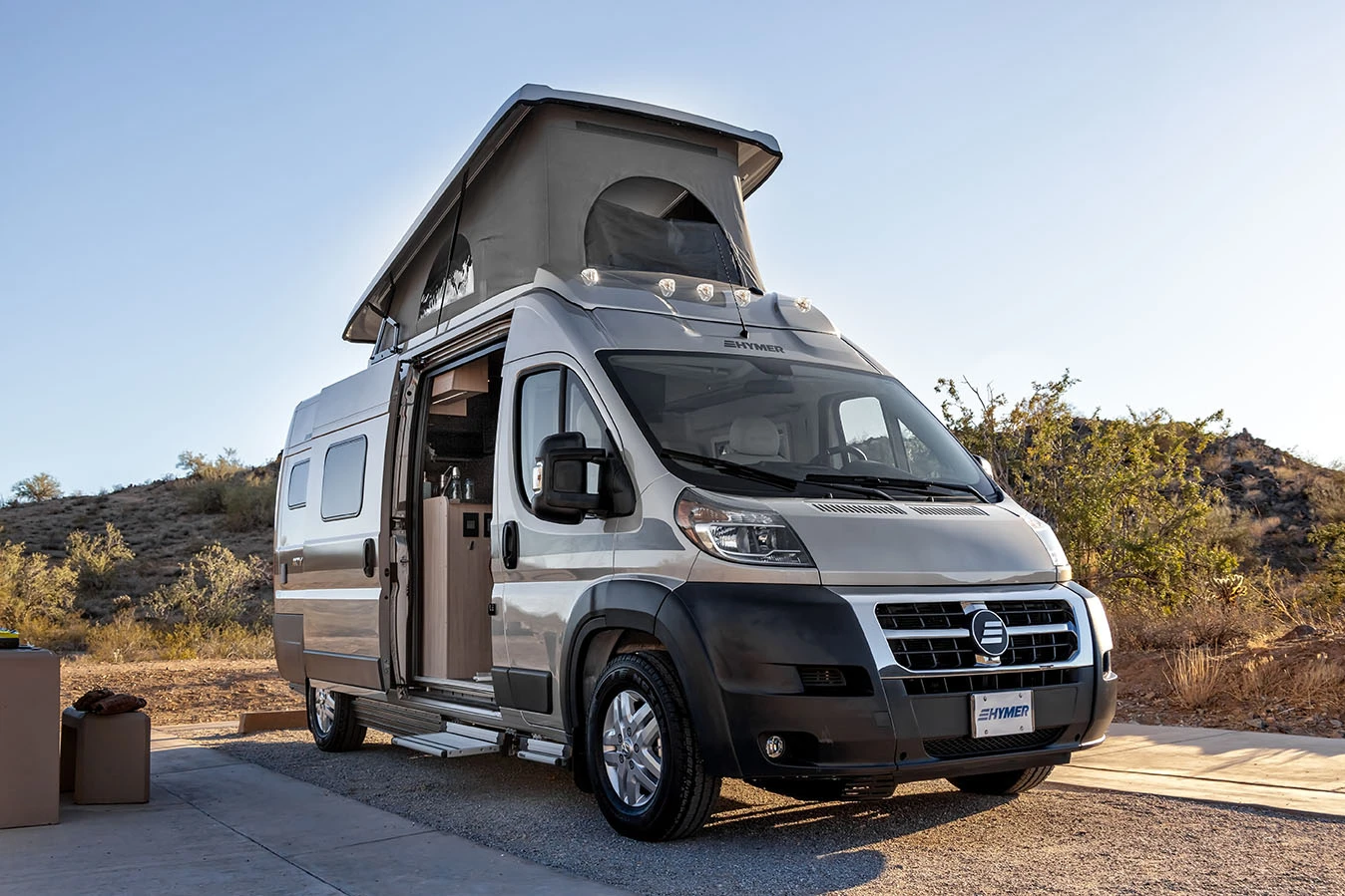 The Hymer Aktiv 2.0 Loft Edition is a pop-top camper van for four to five people