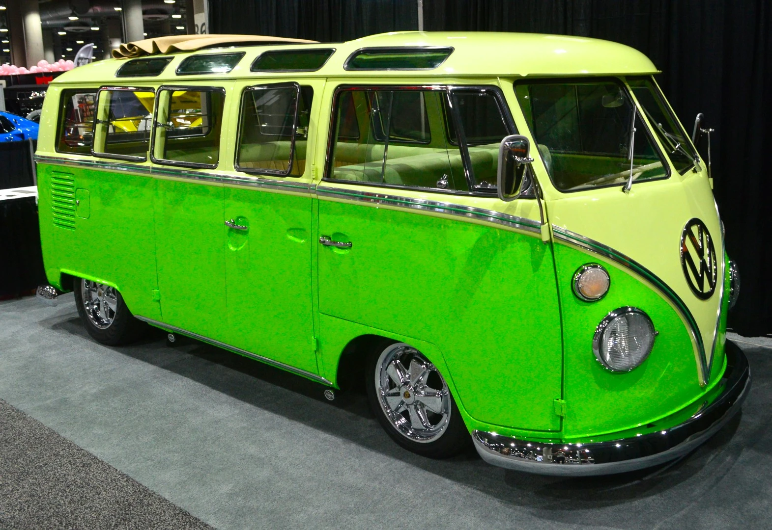 A bright green VW bus downstairs in "The Garage"