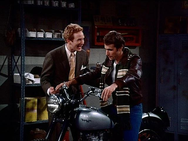 "Happy Days mainstays Ralph Malph (Don Most) and Arthur Fonzarelli (Henry Winkler) with the auctioned Triumph