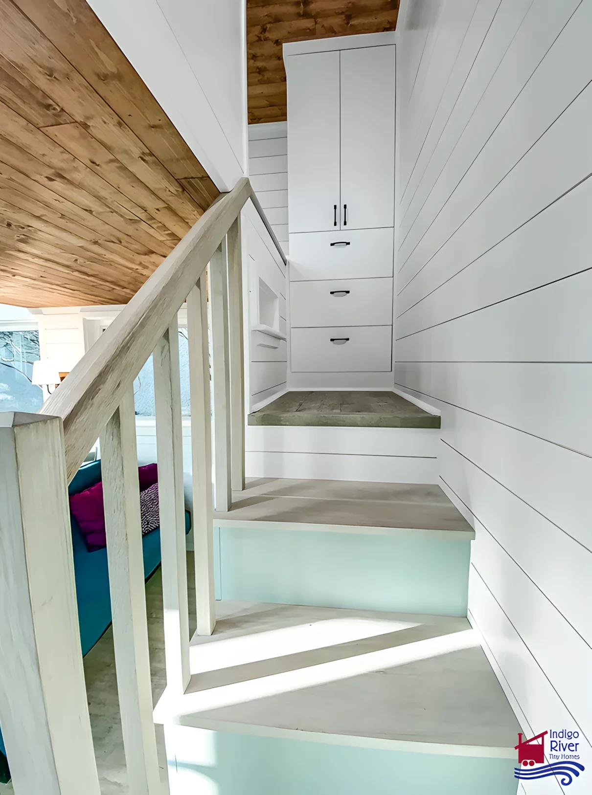 The Elsie's main bedroom is reached by storage-integrated staircase and contains a lowered platform to make it possible for the owners to stand upright