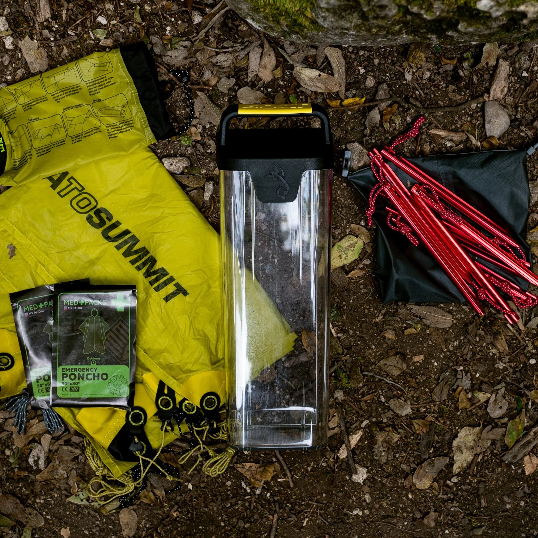 The "Basic Shelter" Can packs emergency shelter gear, including a tarp and emergency blanket/ponchos