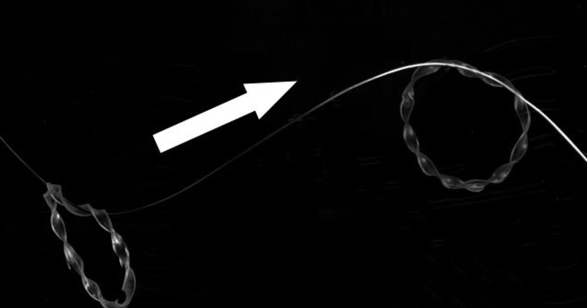 Light powered robot climbs tracks like tiny cable car Light powered robot climbs tracks like tiny cable car