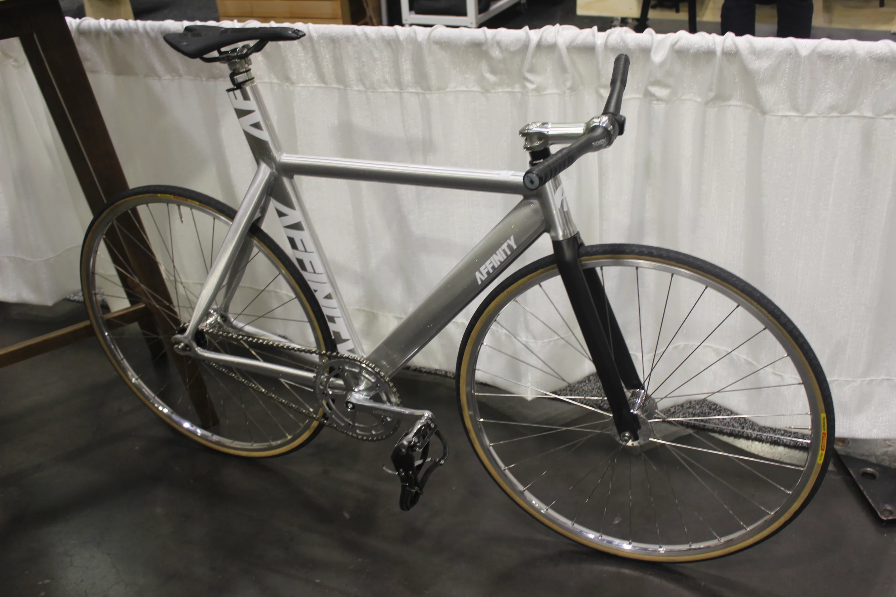 A sparkly silver track-style fixie commuter bike, from Affinity