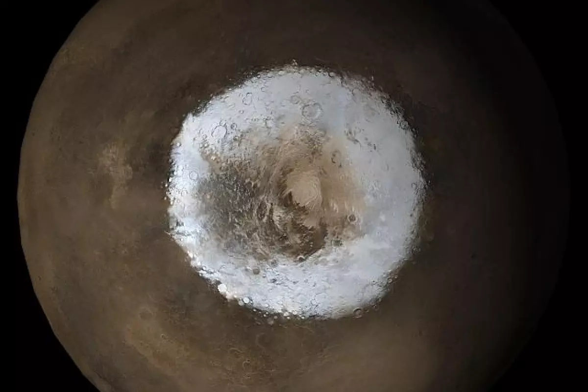 The south pole of Mars, where it's been suggested that there's a subglacial lake of liquid water