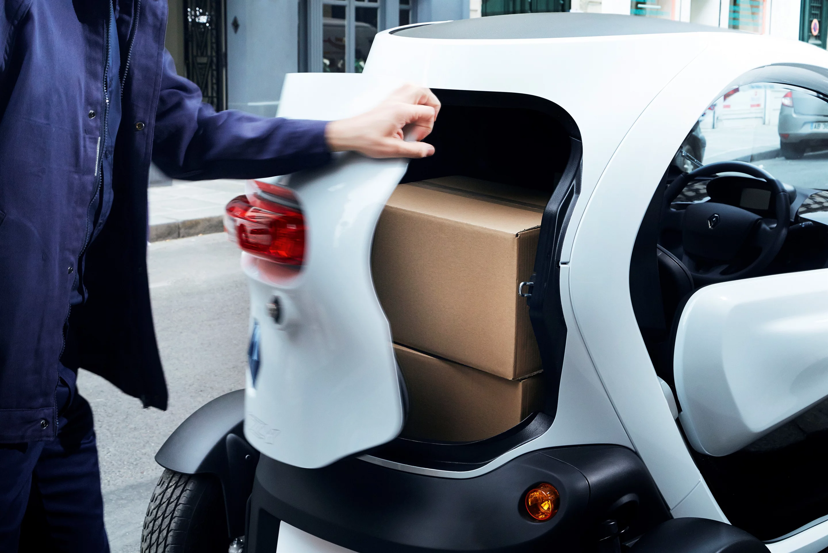 The Twizy Cargo's storage compartment is not going to be nearly enough to transport your baby grand piano, but it should be spacious enough for inner city deliveries of small packets and boxes