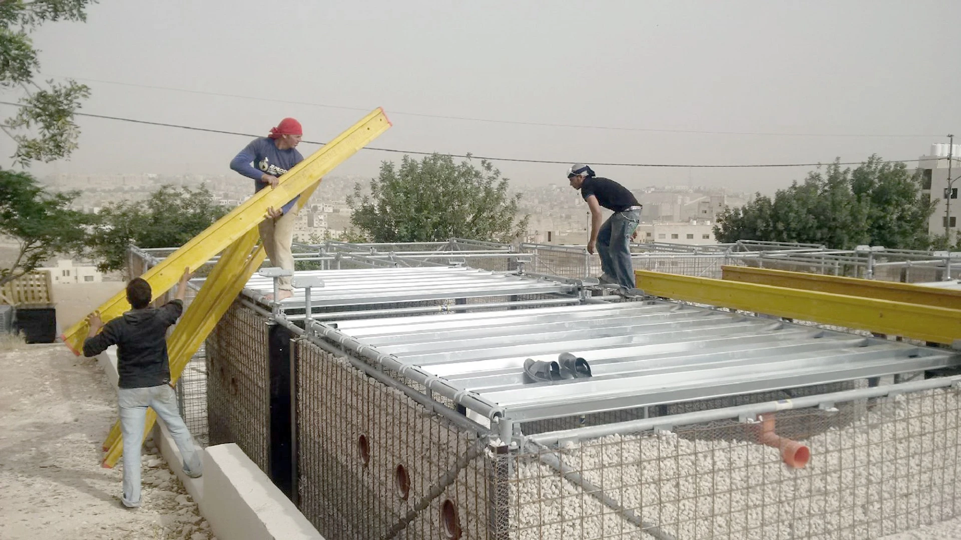 The system is simple and comprises scaffolding tubes, which are are joined together to build a simple frame for whatever structure is required