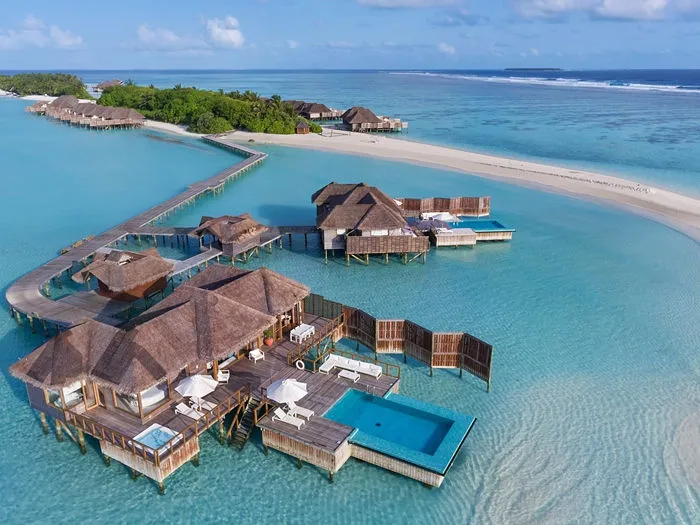 To get to Conrad Maldives you need to take a 30-minute seaplane flight from the nearest main airport. Oh, and did we mention the resort has an underwater restaurant?
