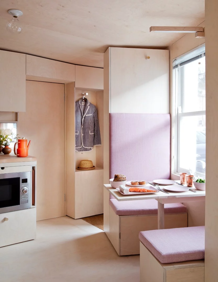 The 13 sq Metre House's kitchenette lies to the left of this shot and the dining booth to the right