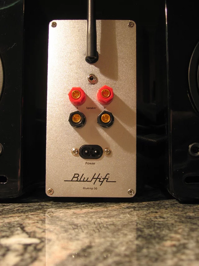 Analog connections for cabling to non-wireless speakers, and a 3.5 mm line-in jack