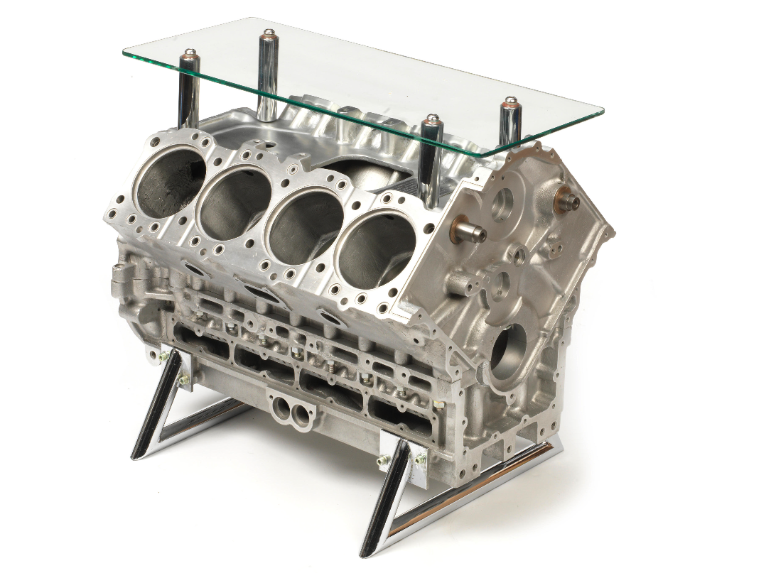A piece of furniture with a compelling story, this coffee table is made from a Ford DFV 919 Formula One engine block. The engine was first used by motorcycle superstar turned car racer Mike Hailwood in the 1974 Belgian F1 Grand Prix at Nivelles, where it finished seventh inside a McLaren M23. It was then used by Emerson Fittipaldi in winning the 1974 Canadian Grand Prix at Mosport Park, also inside a McLaren M23, but this time of far greater historical significance because this was the race in which Fittipaldi became the 1974 World Formula One Drivers Champion. The engine was subsequently blown during a practice session and retired from active duty. Great value at $5,511 (€4,500)