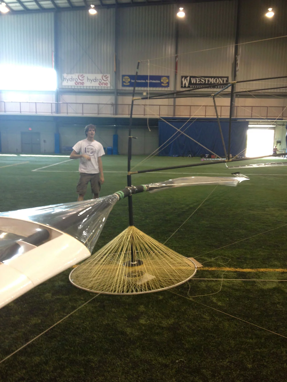 The team is forced to disassembled the aircraft at the end of every day to free up the indoor soccer pitch