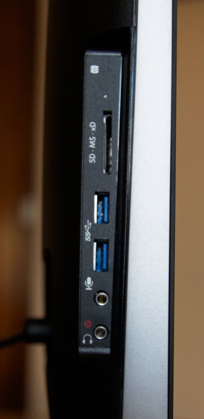 Optional 6-in-1 card reader and USB 3.0 ports are found on the left side along with headphone and mic ports