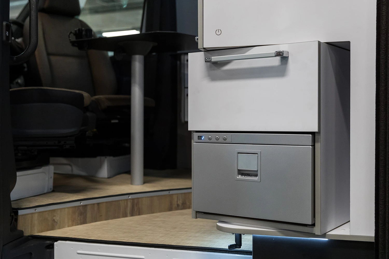 Swivel the fridge out and you can easily access drinks without climbing aboard