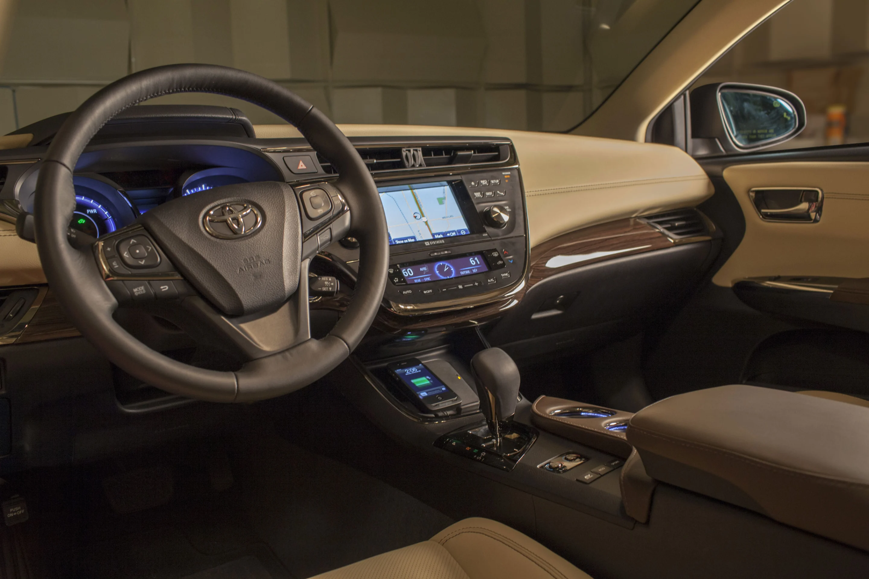 The Qi charger is integrated into the Ebin in the center console