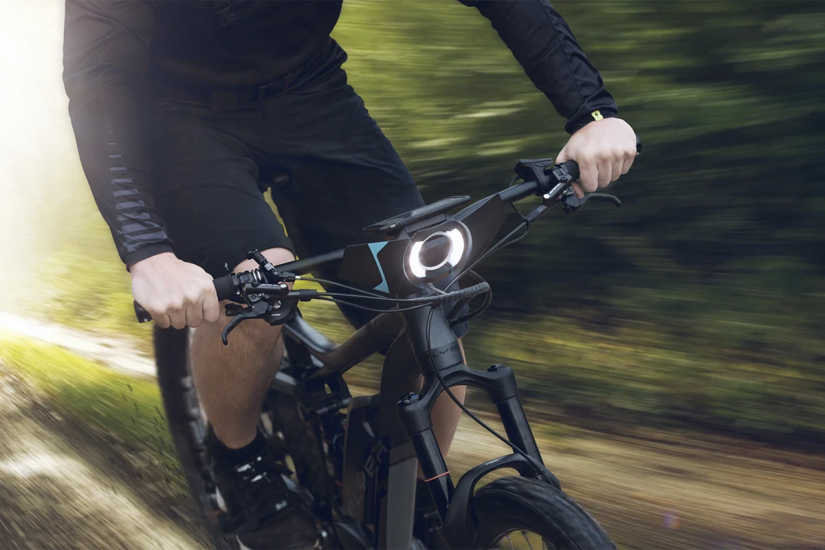 The COBI system combines the user's smartphone with sensors and peripheral devices