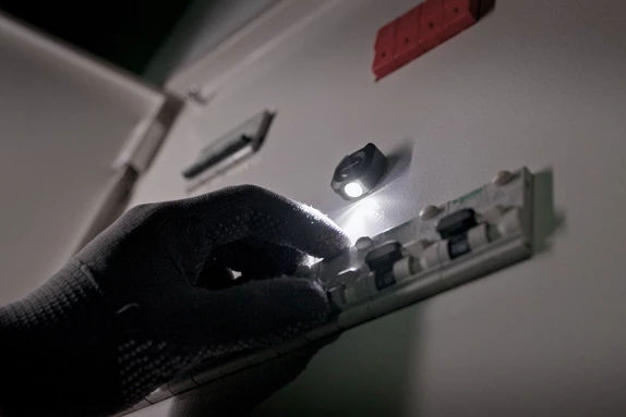 The flashlight can be magnetically mounted in either of two orientations, depending on the task at hand