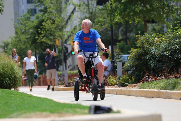 The Liberty Trike lets users just motor along, or get some exercise by pedaling