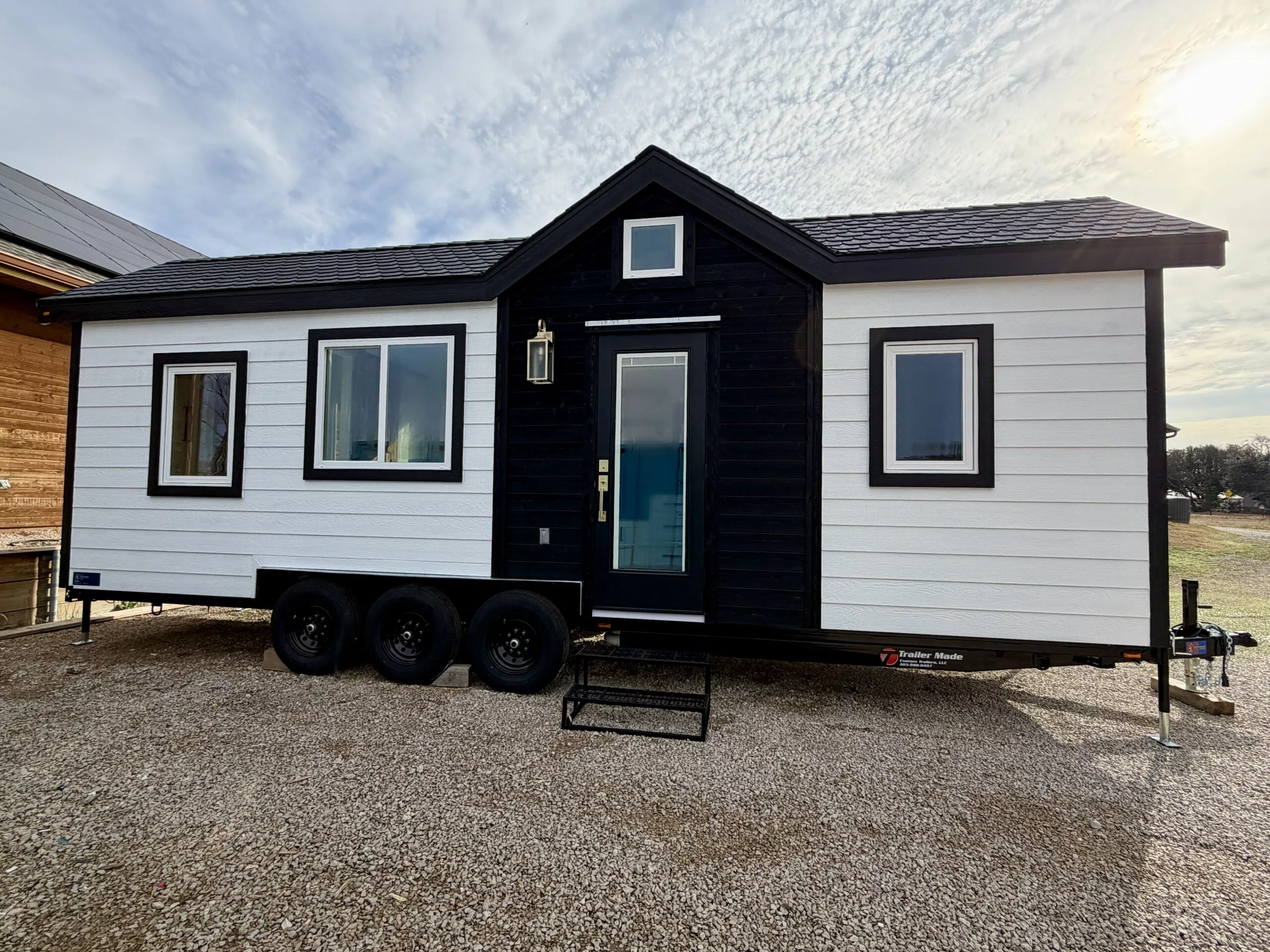 The Betty tiny house is a compact towable home for two that packs in lots of storage and a well-designed interior