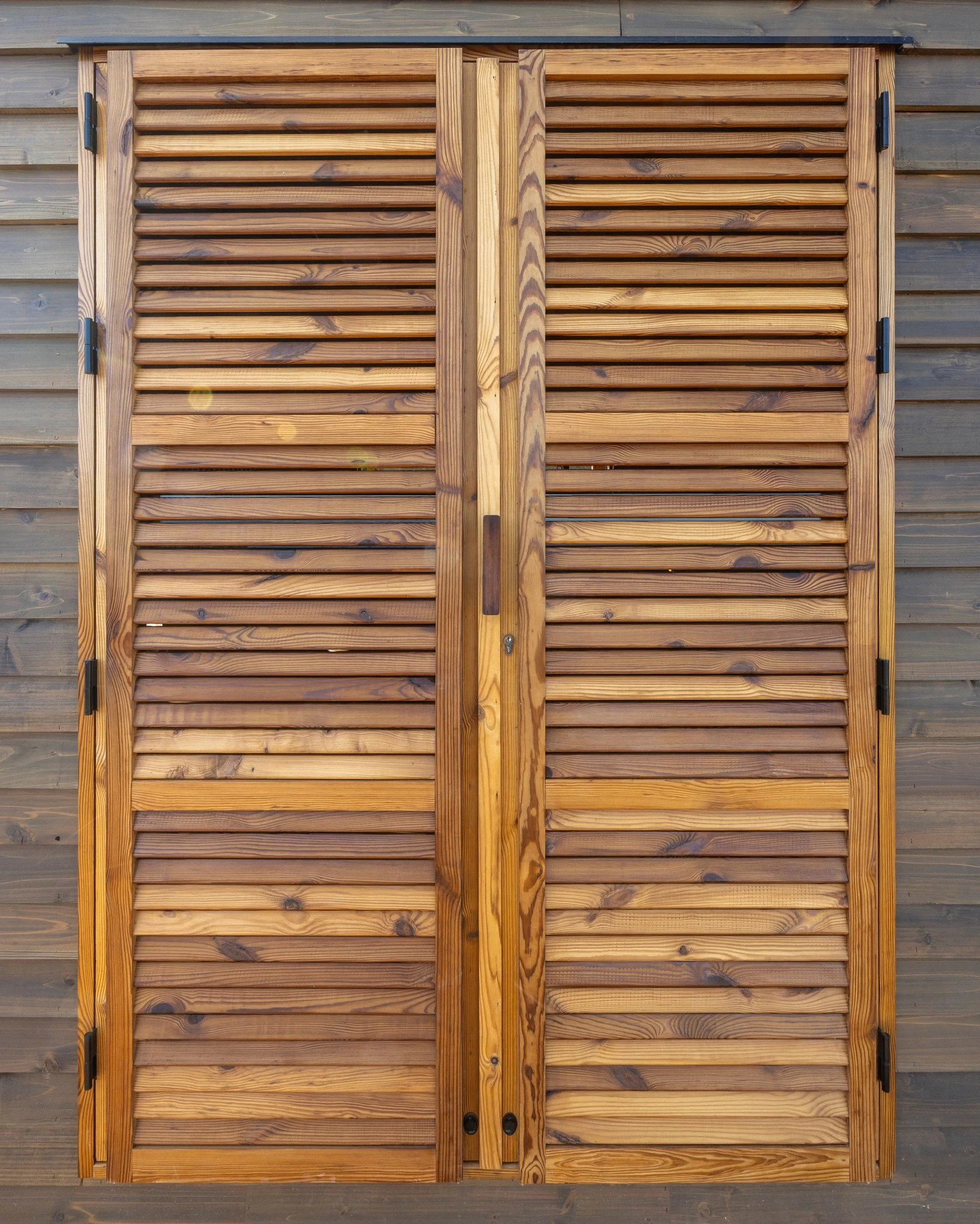 The Barca's traditional shutters help control daylight inside the home