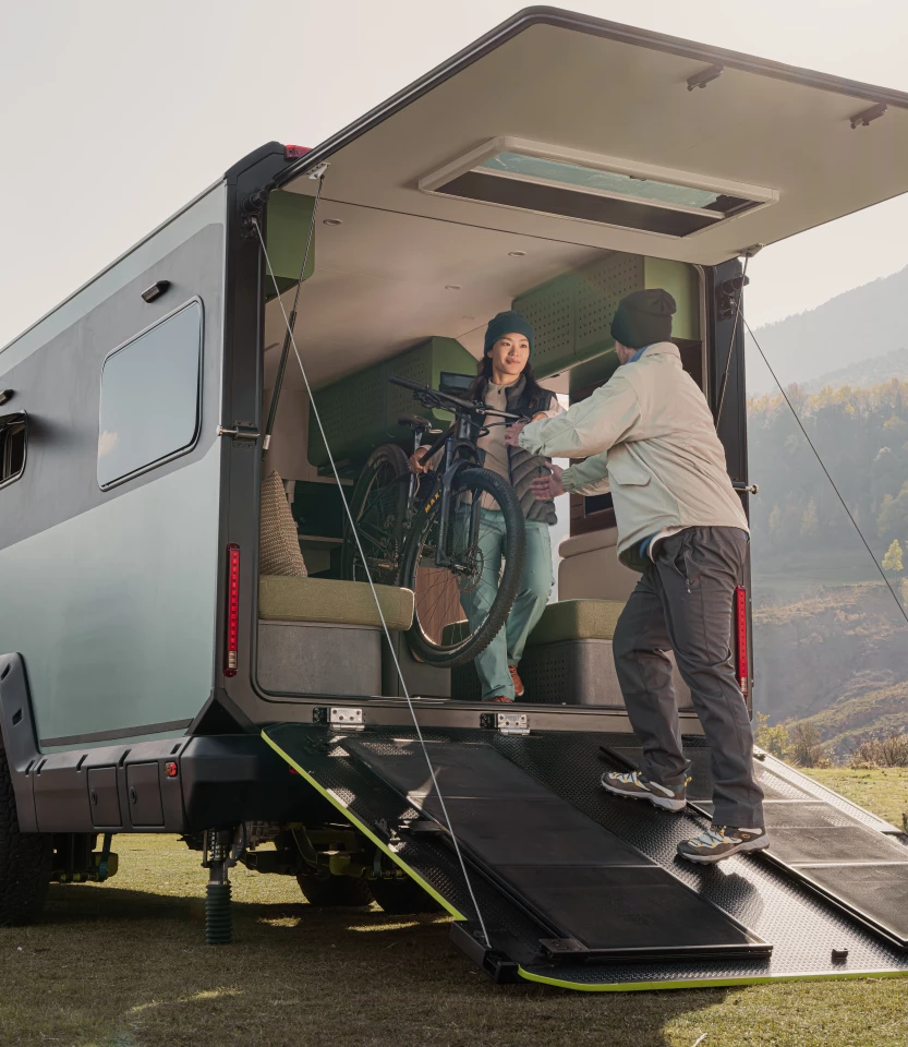 The power-lowered deck features multiple positions to serve as both a terrace and a load ramp