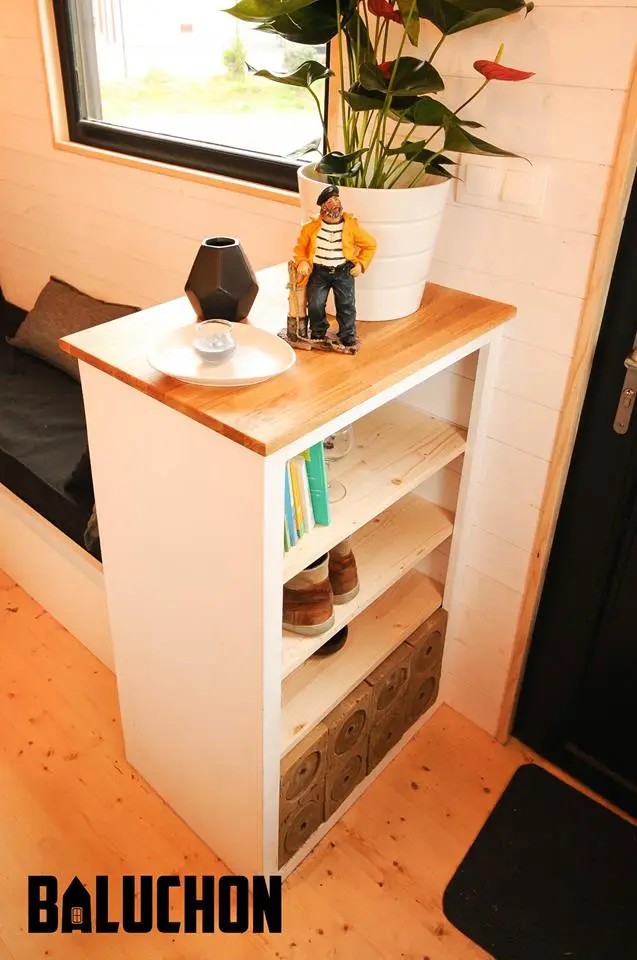 This storage area includes a clay pot for the Calypso's owners to keep wine cool