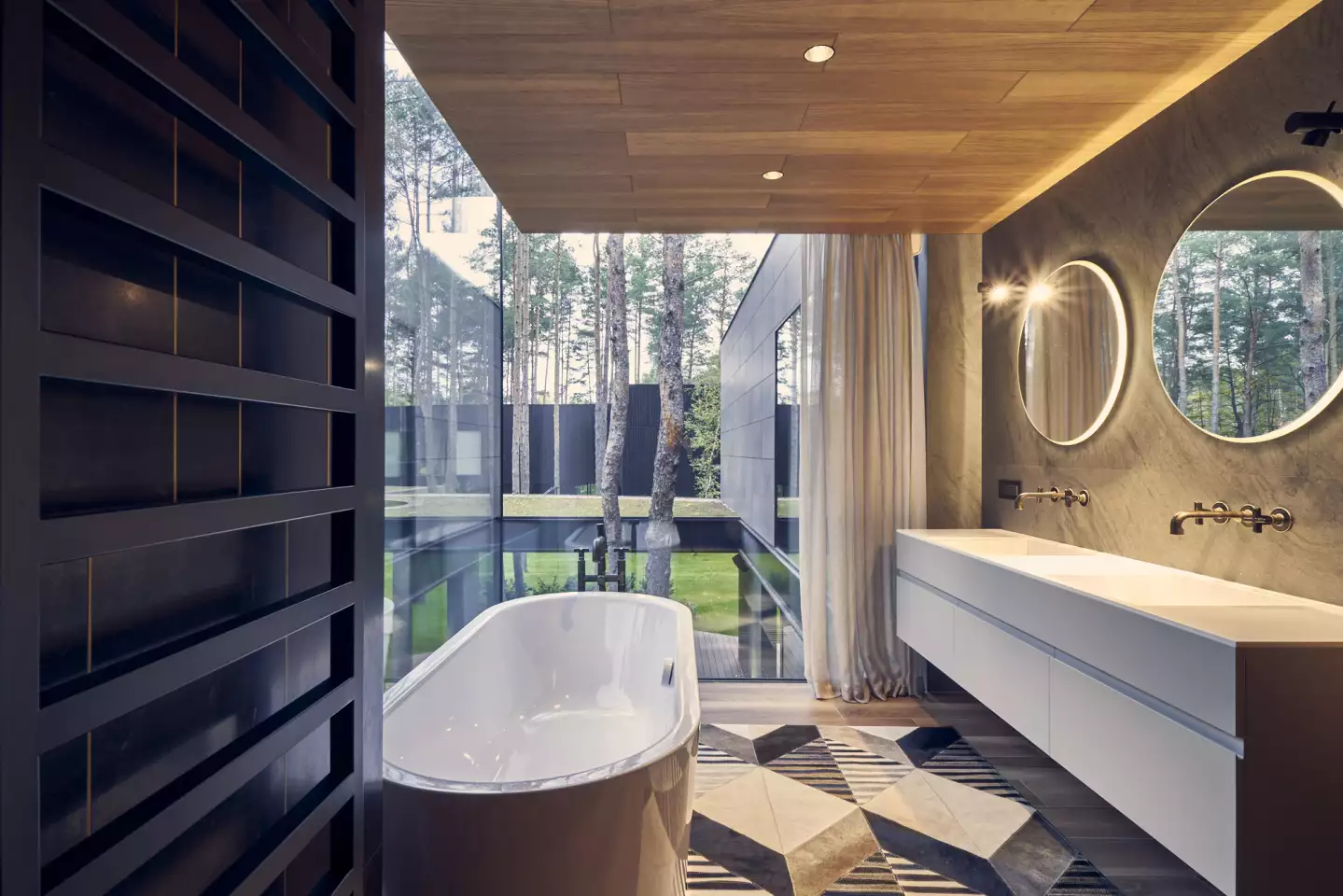Circle Wood's upstairs includes private areas like bedrooms and bathrooms, which overlook the central garden atrium