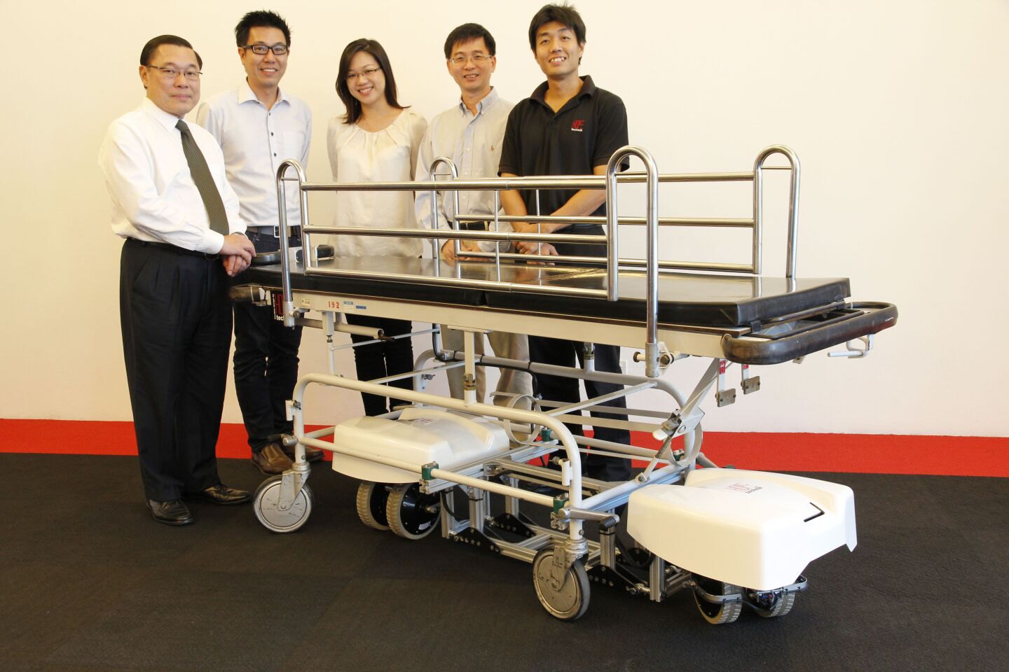 Members of the development team, with a SESTO-equipped bed