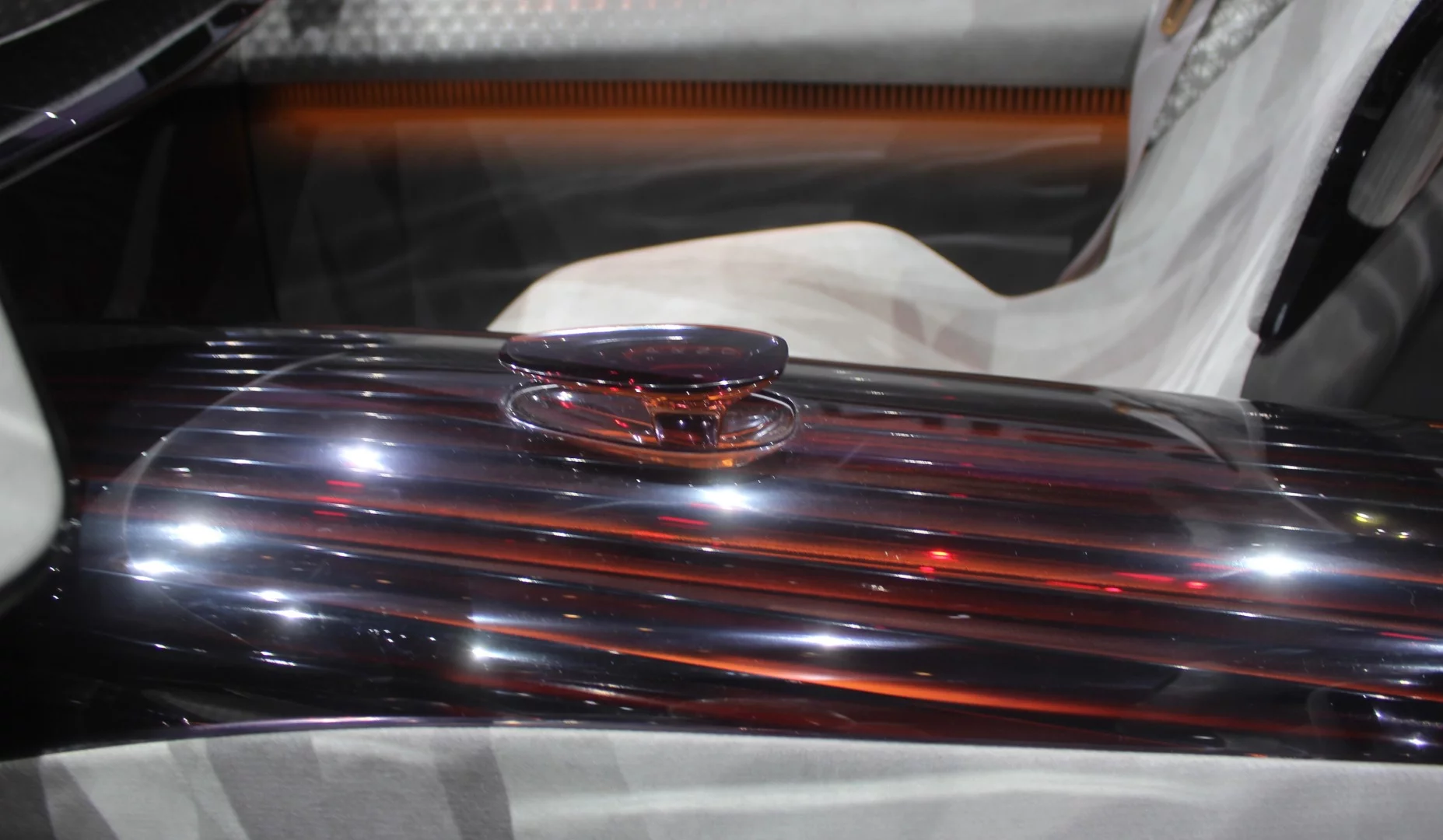 The IMQ's center console stretches from front to back and includes this controller